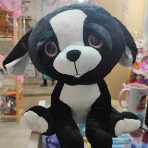 Black dog cuddly toy