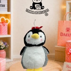 Peluche de pingüino con lacito rojo
